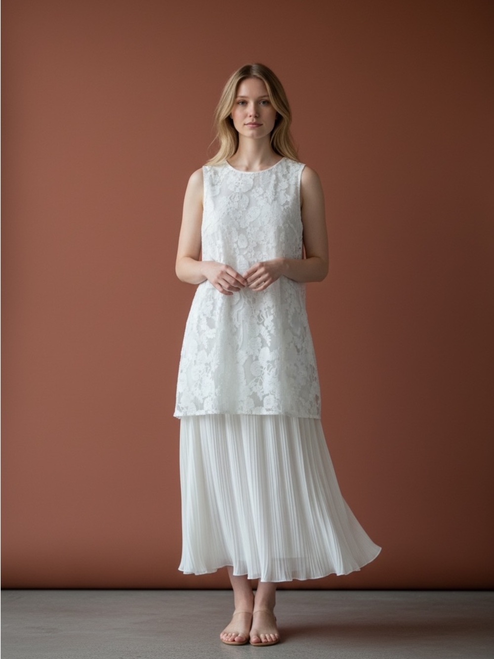 Sleeveless White Lace Overlay Dress with Pleated Skirt